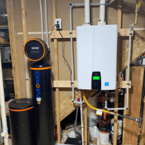 Puronics and tankless water heater in basement