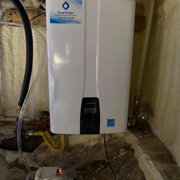 Tankless water heater in basement